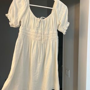 Cream flowey off the shoulder or cap sleeve dress